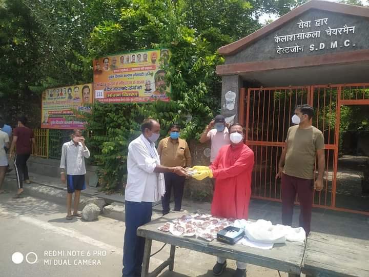 yashasvi pradhanmantri shri narendra modi ji dwara bataye gaye ayurvedik kadha or mask vitran
